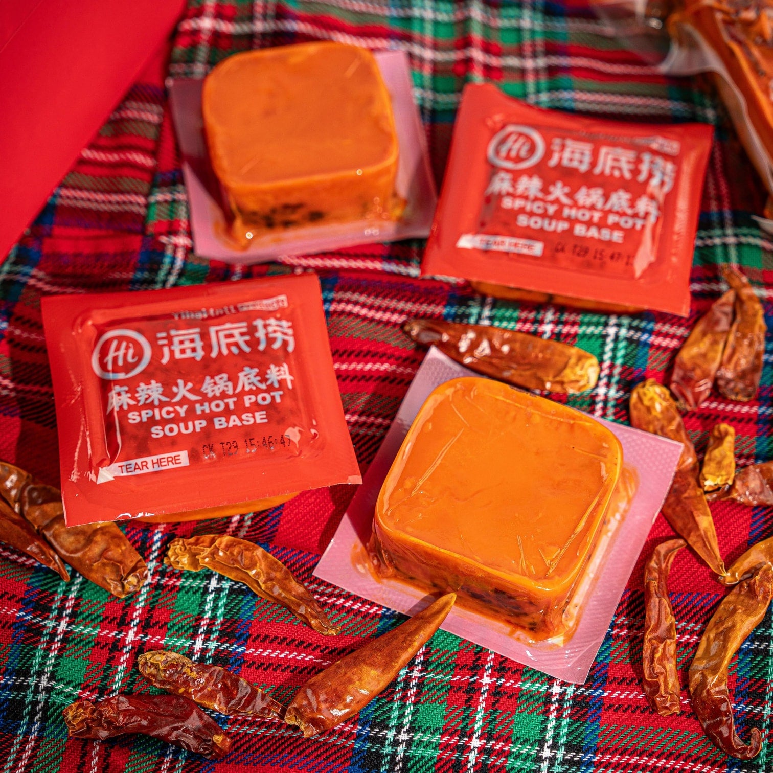 Individual soup base blocks of HAIDILAO Spicy Hot Pot Soup Base with dried chili peppers