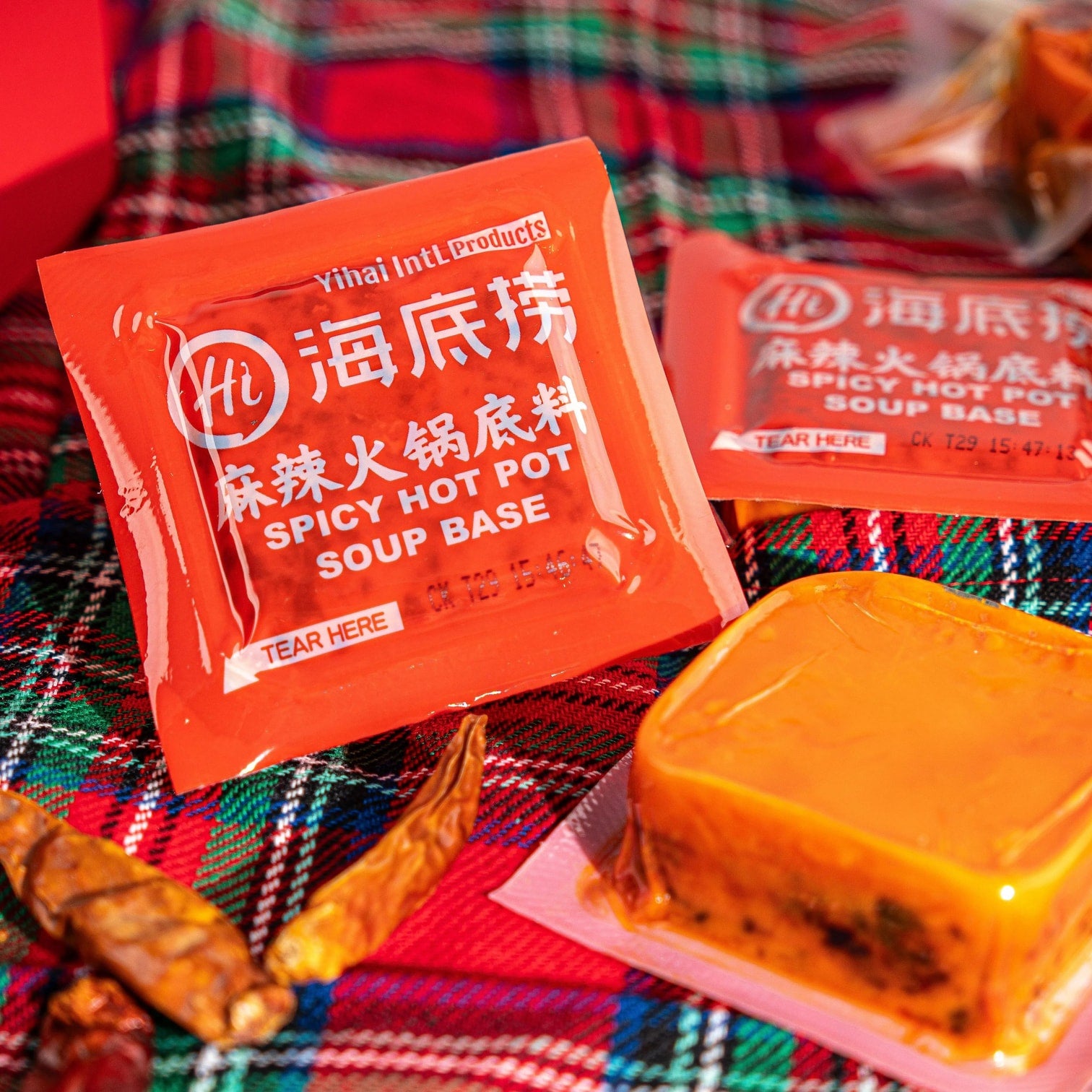 HAIDILAO Spicy Hot Pot Soup Base individual sealed packets with soup base block and dried chili peppers