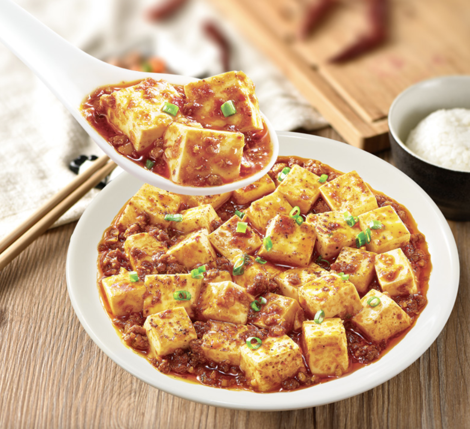 Plate of mapo tofu with minced pork, scallions, and chili sauce made with HAIDILAO Mapo Tofu Sauce