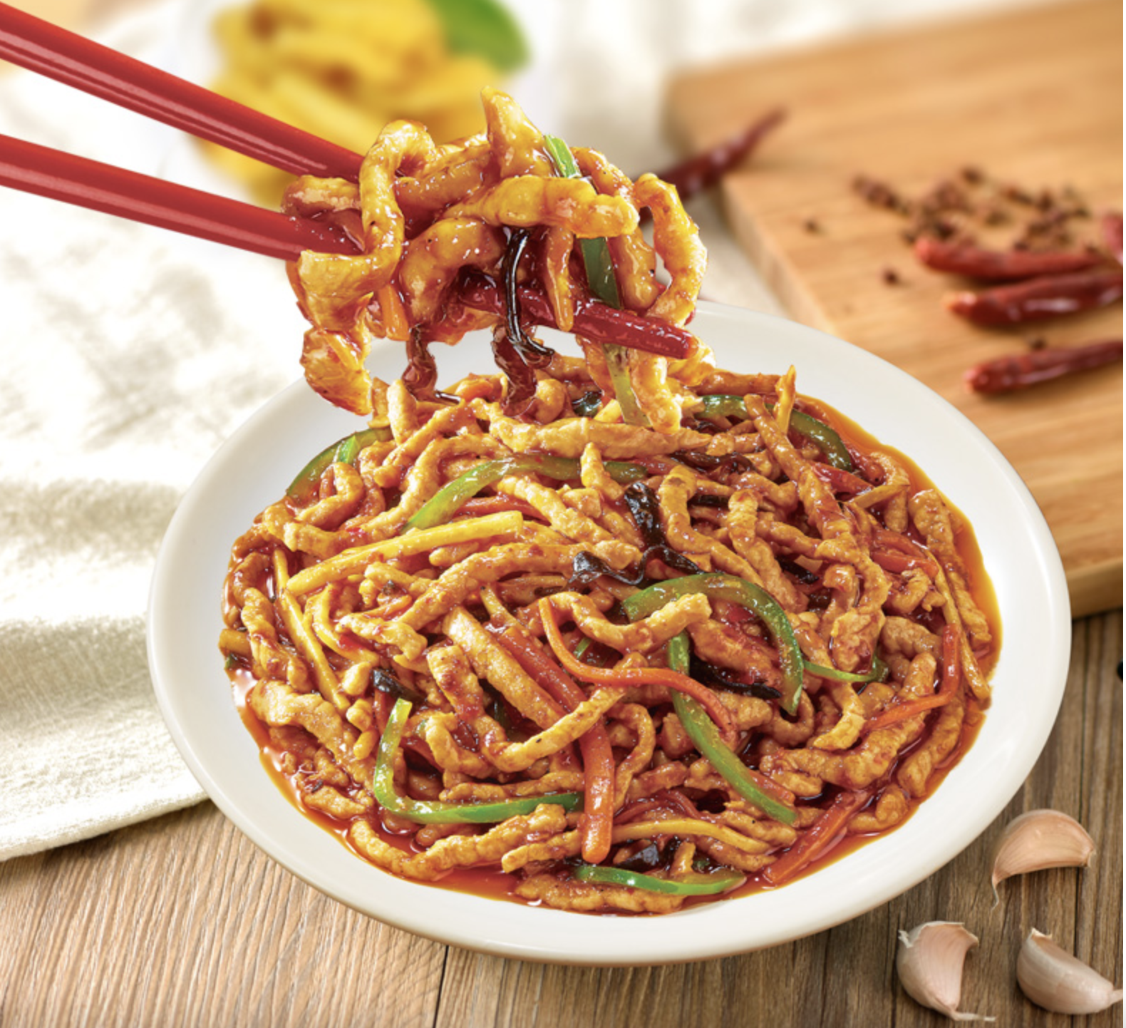 Plate of Yu-Shiang shredded pork with peppers in chili garlic sauce made with HAIDILAO Yu-Shiang Shredded Pork Sauce