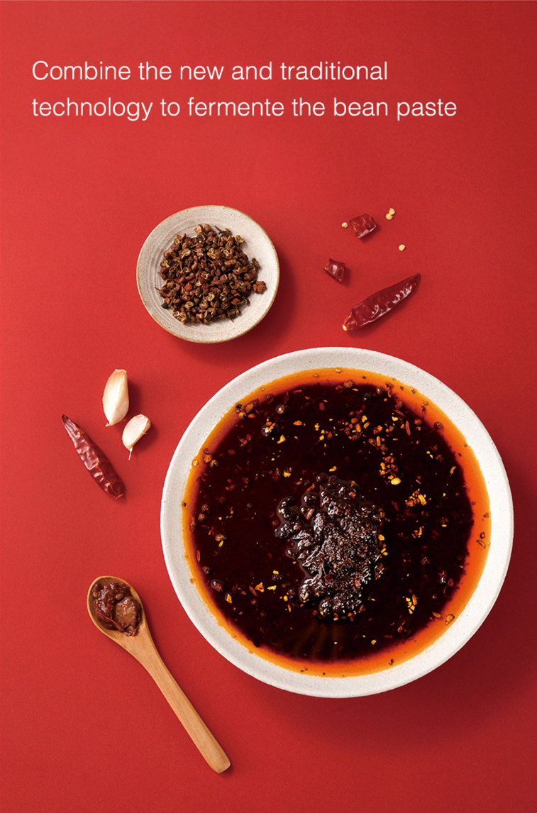 Bowl of fermented Sichuan bean paste with chili and Sichuan peppercorn, combining new and traditional fermentation technology